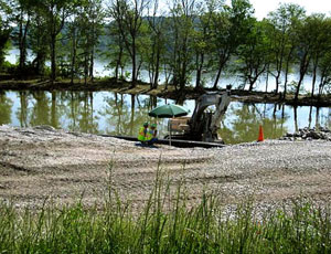 Near the TVA powerplant site with a failed ash-disposal cell, dredging of the Emory River is almost complete after 18 months. 