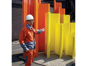 Project Manager Roland Bastian with interlocking, Z-section sheet piles recycled from scrap metal.