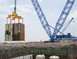  In Zhejiang province, a module is placed at the Sanmen nuclear power-plant, one of six plants Shaw Group will build for China.