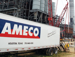 An AMECO job trailer supplies tools and safety gear to an industrial construction project.