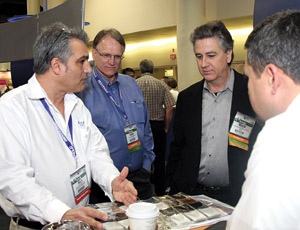 On the expo floor in Ft. Lauderdale at the American Composites Manufacturers Association annual meeting, members of the fast-growing $17.7-billion-a-year industry talk business. 
